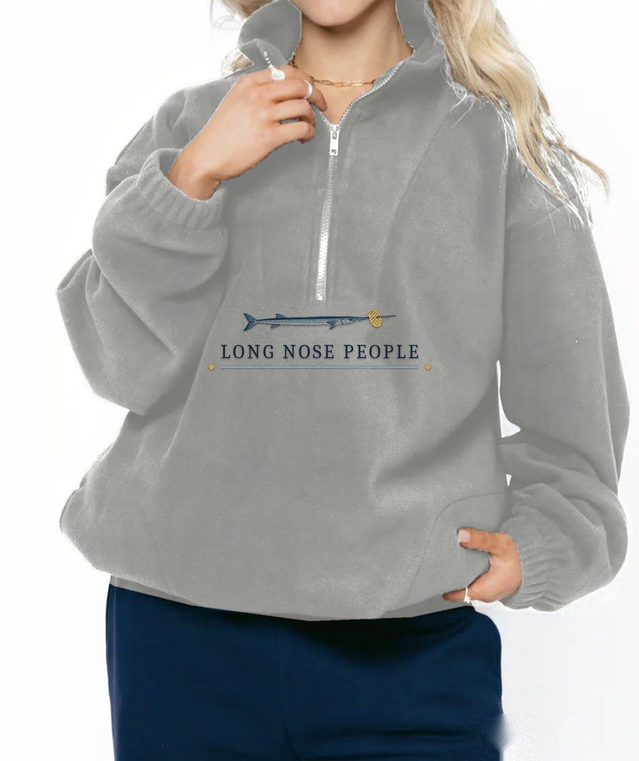 Montserrat harbour grey fleece quarter zip with an embroidered needlefish and Long Nose People lettering under the zip