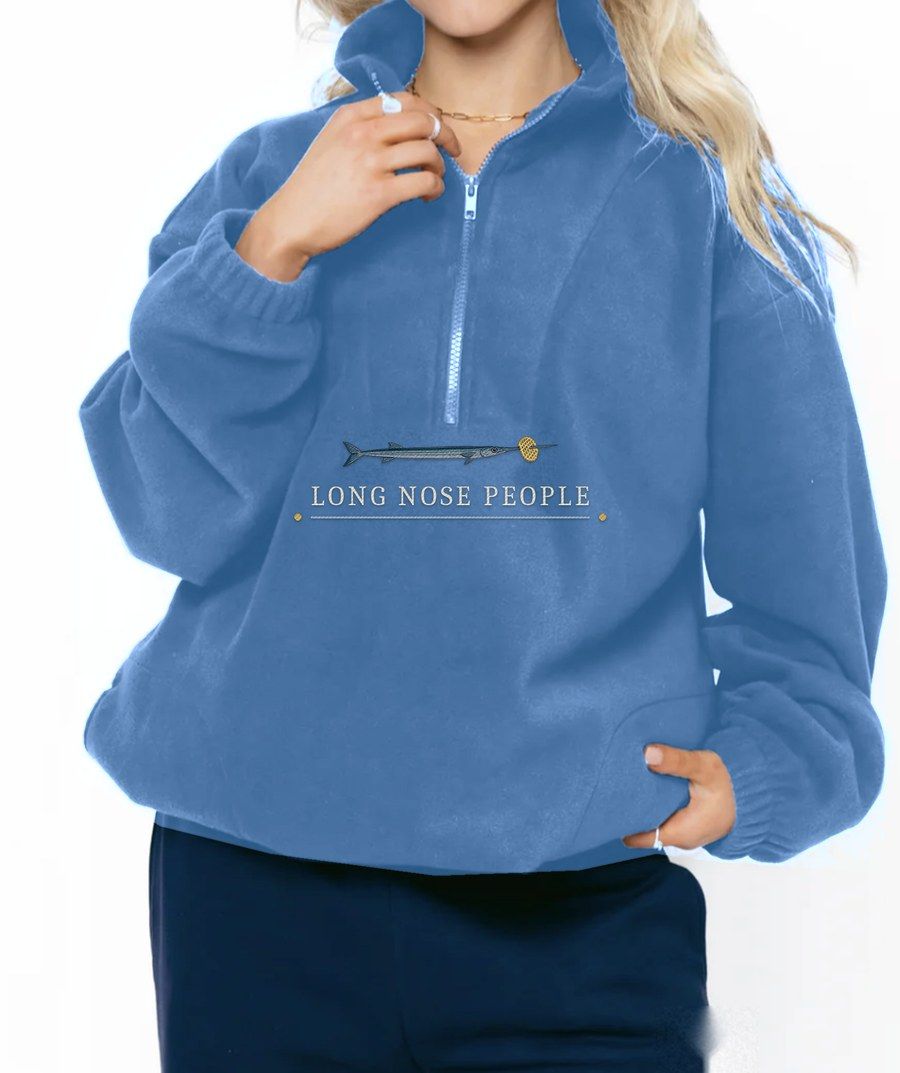 Bequia riviera blue fleece quarter zip with an embroidered needlefish and Long Nose People lettering under the zip