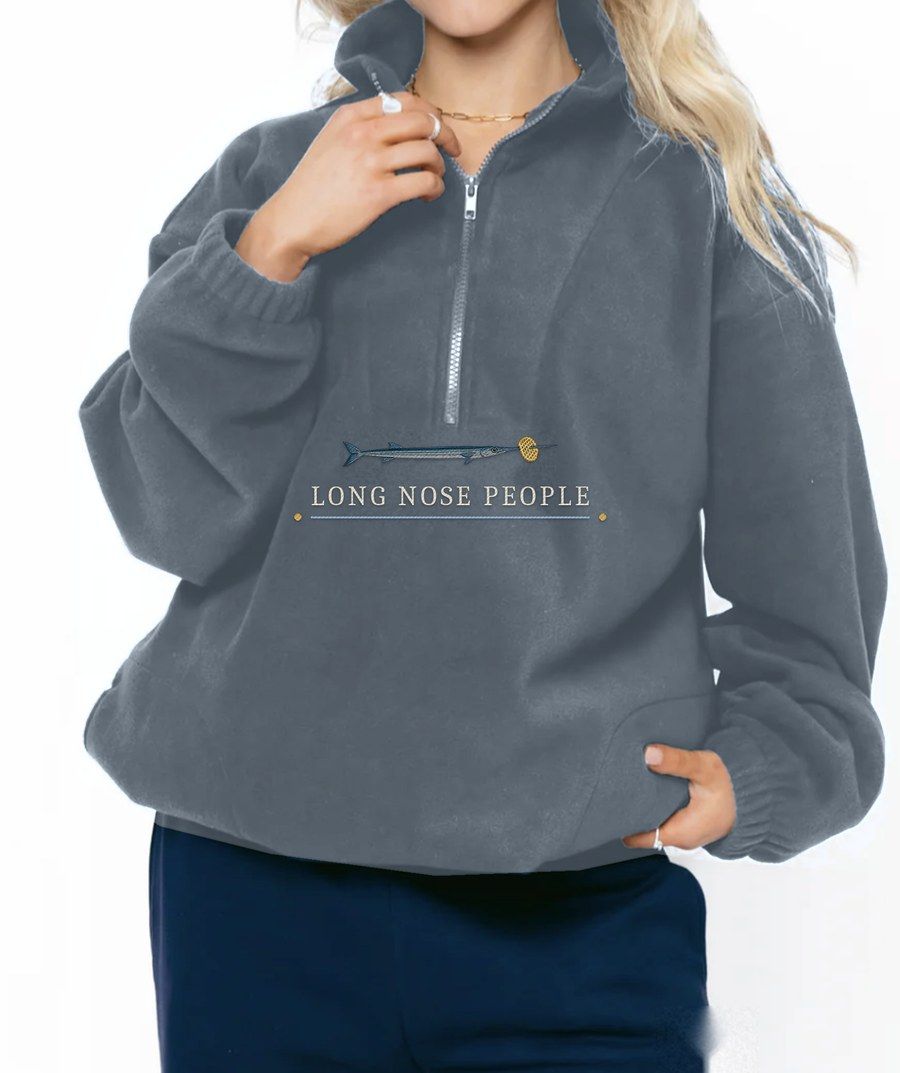Dominica slate fleece quarter zip with an embroidered needlefish and Long Nose People lettering under the zip